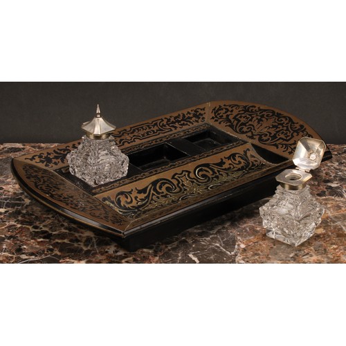 1921 - An Edwardian Boulle and ebonised brass marquetry inkstand, shaped rectangular body, the central well... 