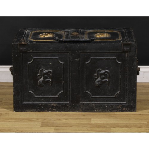 1321 - A 19th century cast iron strong box, the door and sides cast with lions, carry handles to sides, the... 