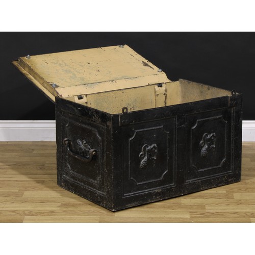 1321 - A 19th century cast iron strong box, the door and sides cast with lions, carry handles to sides, the... 