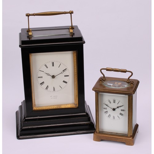 1218 - A French ebonised carriage type mantel timepiece, late 19th century, four-glass case with brass swin... 