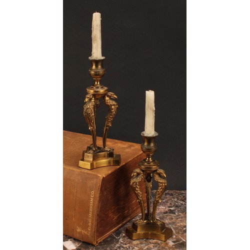 1290 - A pair of 19th century gilt bronze triform mantel candlesticks, campana sconces, griffin monopodia, ... 