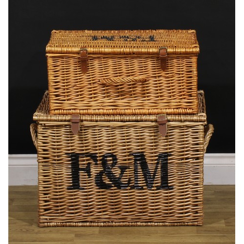 135 - A large Fortnum & Mason wicker two-handled hamper, 39.5cm high, 58cm wide excluding handles; another... 