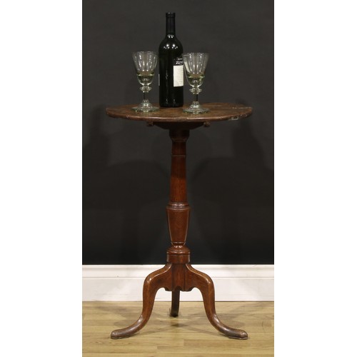 1403 - A George III oak tripod occasional table, circular tilting top, turned column, cabriole legs, pointe... 