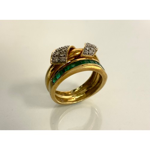 963 - **CLIENT COLLECTING BACK**An emerald and diamond two section interconnected ring, one section channe... 