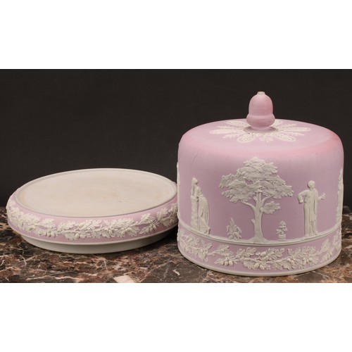 11 - A late Victorian lilac pink jasperware cheese dome, applied with Classical figures, trees and bands ... 