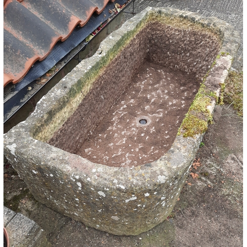 1466 - A large gritstone garden trough, 49cm high, 137cm wide, 68cm deep

NB this lot remains in situ near ... 