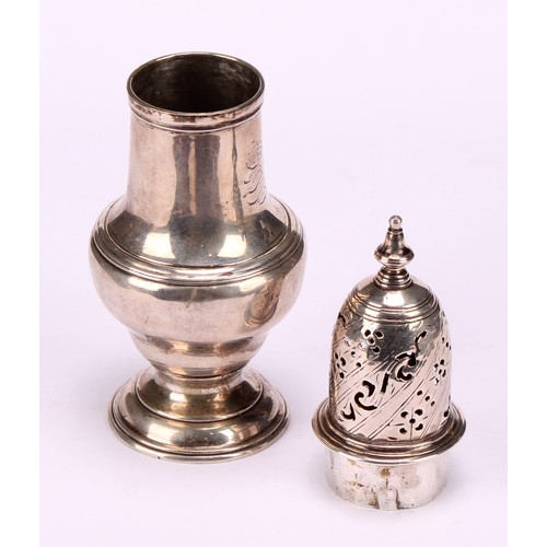 623 - A George II baluster sugar caster, pierced domed cover, spire finial, engraved with a jackal crest, ... 