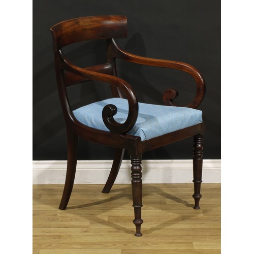 1268 - A set of six George IV mahogany bar-back dining chairs, comprising four side chairs and a pair of ca... 