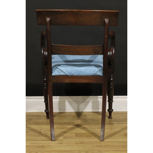 1268 - A set of six George IV mahogany bar-back dining chairs, comprising four side chairs and a pair of ca... 