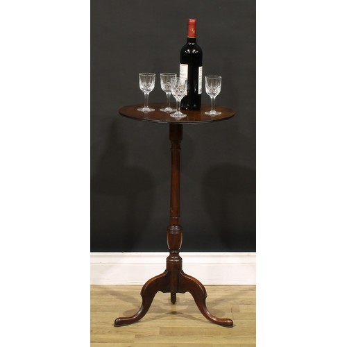 1186 - A George III mahogany wine table, circular top with channelled edge, turned column, cabriole legs, p... 