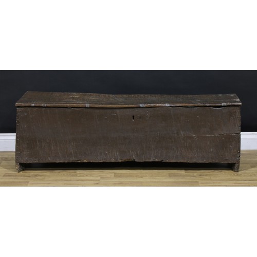 1312 - A 16th century oak six-plank sword chest, hinged cover, 42.5cm high, 136cm wide, 34cm deep