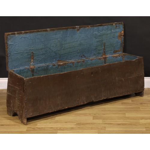 1312 - A 16th century oak six-plank sword chest, hinged cover, 42.5cm high, 136cm wide, 34cm deep