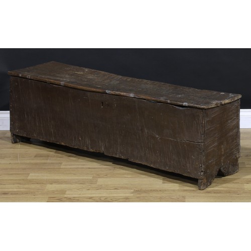 1312 - A 16th century oak six-plank sword chest, hinged cover, 42.5cm high, 136cm wide, 34cm deep