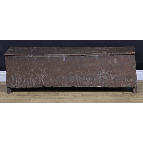 1312 - A 16th century oak six-plank sword chest, hinged cover, 42.5cm high, 136cm wide, 34cm deep