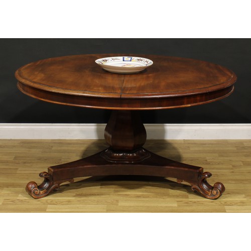 1352 - A Victorian mahogany centre table, circular tilting top with moulded edge, panelled baluster column,... 