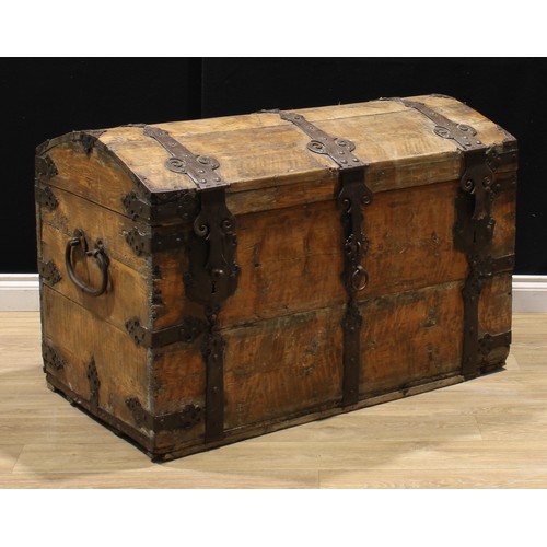 1486 - A 19th century metal bound pine chest, possibly German, hinged top, carry handles to sides, 75.5cm h... 