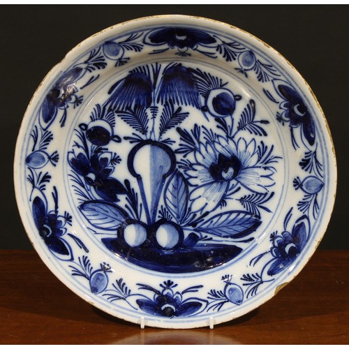 6 - A collection of six 18th and 19th century Delft chargers, 34.5cm/35cm (6)