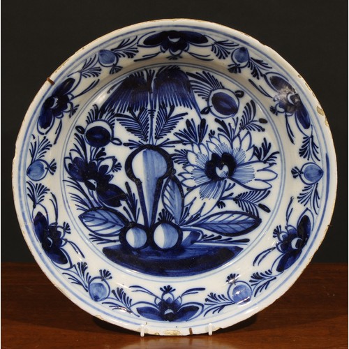 6 - A collection of six 18th and 19th century Delft chargers, 34.5cm/35cm (6)