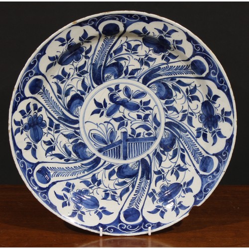 6 - A collection of six 18th and 19th century Delft chargers, 34.5cm/35cm (6)