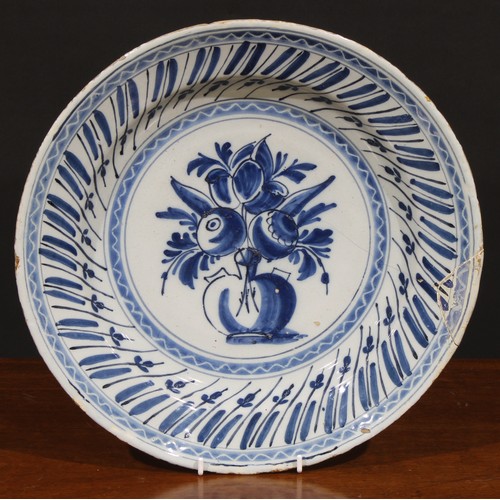 6 - A collection of six 18th and 19th century Delft chargers, 34.5cm/35cm (6)