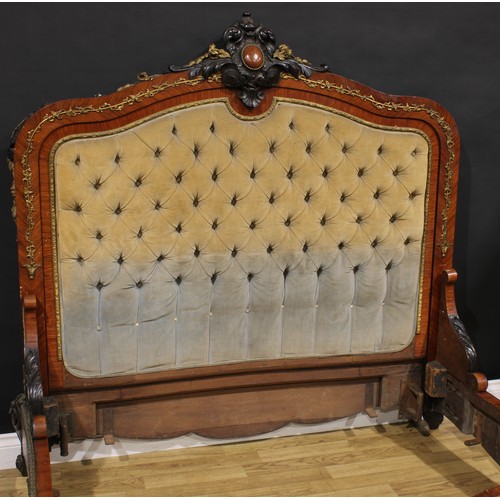 1232 - A French gilt metal and porcelain mounted kingwood bed, in the Louis XV taste, the headboard 147cm h... 