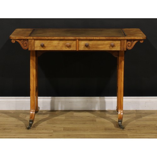 1208 - A George IV walnut writing table, rounded rectangular top with inset tooled and gilt writing surface... 