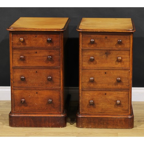 1341 - A pair of Victorian mahogany bedroom chests, each of four graduated drawers, probably formerly the p... 