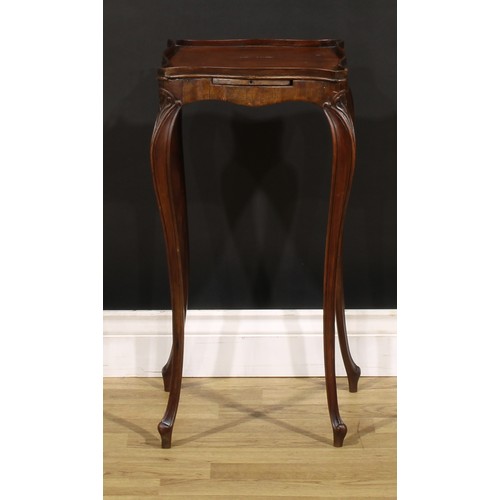 1485 - A 19th century mahogany urn or kettle stand, in the French Hepplewhite taste, 63cm high, the top 30.... 