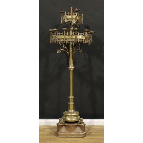 1368 - A large Gothic Revival brass floor-standing ecclesiastical candelabrum, oak plinth base, 207.5cm hig... 