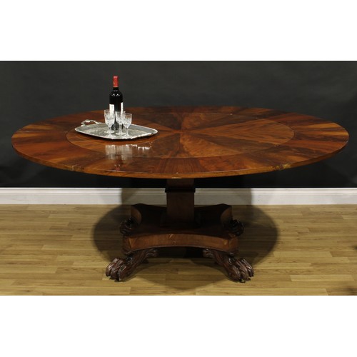 1454 - A William IV mahogany dining table, in the manner of Johnstone, Jupe & Co, circular top with segment... 