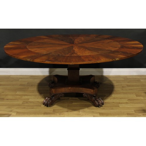 1454 - A William IV mahogany dining table, in the manner of Johnstone, Jupe & Co, circular top with segment... 