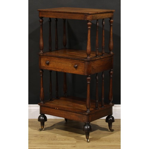 1877 - A William IV rosewood three-tier whatnot, rounded rectangular plateaux, turned supports, drawer to c... 