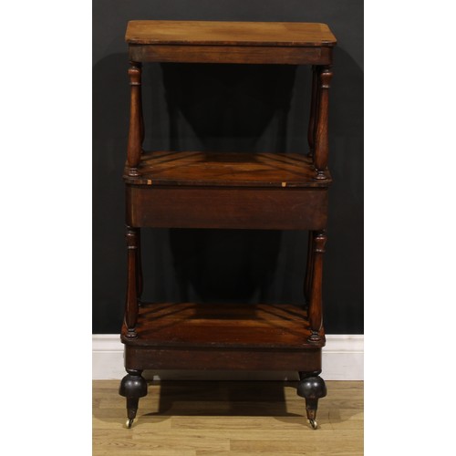 1877 - A William IV rosewood three-tier whatnot, rounded rectangular plateaux, turned supports, drawer to c... 