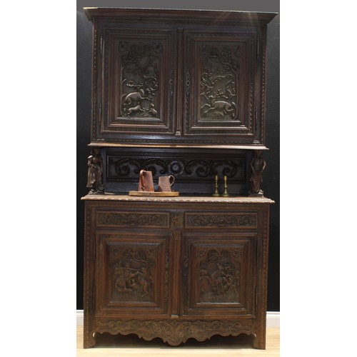 1414 - A late 19th century French provincial chestnut Breton buffet cabinet, moulded cornice above a pair o... 