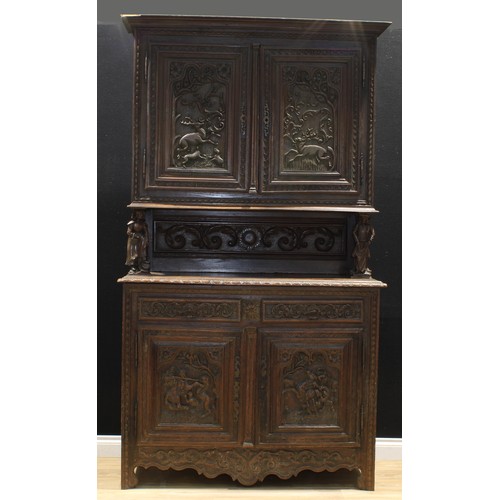 1414 - A late 19th century French provincial chestnut Breton buffet cabinet, moulded cornice above a pair o... 