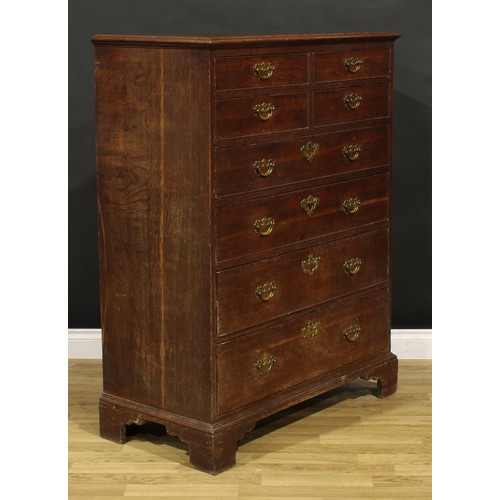 1191 - A George III oak chest, of unusual configuration, rectangular top with moulded edge above two pairs ... 