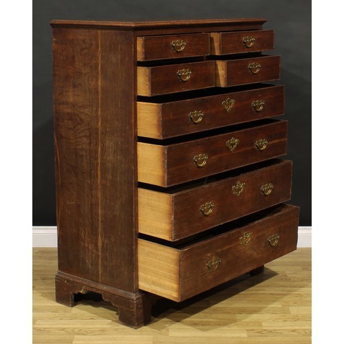 1191 - A George III oak chest, of unusual configuration, rectangular top with moulded edge above two pairs ... 