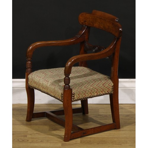 1412 - A George IV mahogany child’s armchair, curved flame-veneered cresting rail, the mid-rail with three ... 