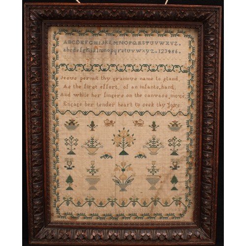 347 - A Victorian needlework sampler, by Mary Bromley, aged eight, 1847, with trees and fauna in a floral ... 