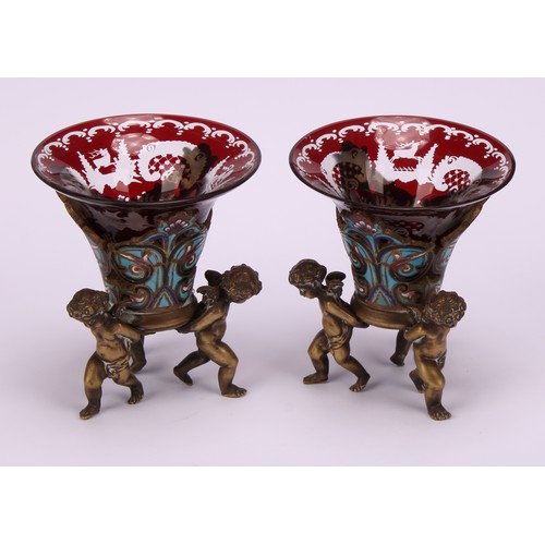 1239 - A pair of French patinated bronze and champleve enamel mantel vases, each with Bohemian glass liner ... 