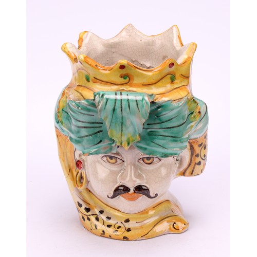 14 - A Sicilian Caltagirone maiolica vase, modelled as the head of a Moorish king, 14.5cm high, painted m... 