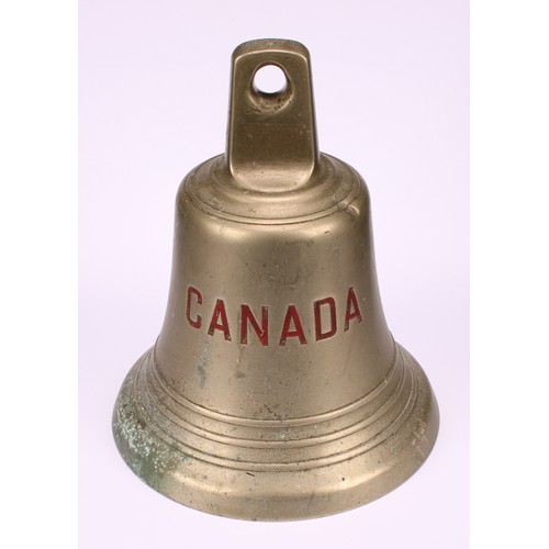 1919 - An early 20th century ship's bell, inscribed in red Canada, 24.5cm high