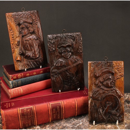 1297 - A set of three Romayne type oak panels, carved in relief with Renaissance musicians, 20cm x 11.5cm