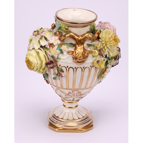 38 - A pair of John Bevington porcelain pedestal vases, of Neo Classical form, encrusted with flowers, gi... 