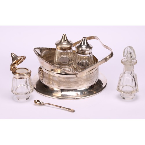 572 - An early 20th century E.P.N.S novelty four-bottle cruet, as an officer's cap, engine turned band, 13... 