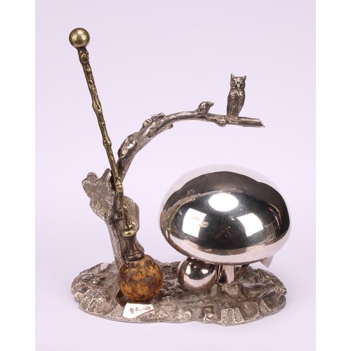 549 - A late Victorian/Edwardian E.P.N.S novelty table top dinner gong, as an owl on a branch, perched abo... 