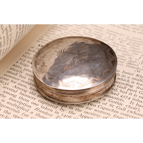 581 - A 19th century Dutch silver circular peppermint box, wriggle-work engraved, hinged cover, 5cm diam