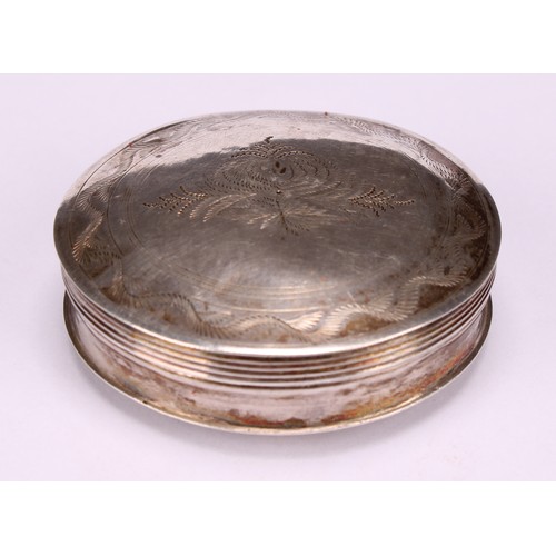 581 - A 19th century Dutch silver circular peppermint box, wriggle-work engraved, hinged cover, 5cm diam