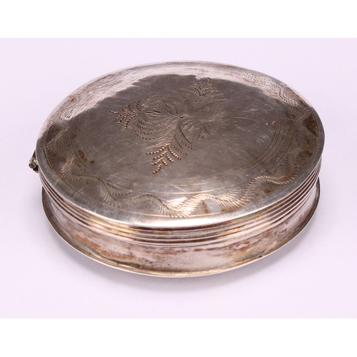 581 - A 19th century Dutch silver circular peppermint box, wriggle-work engraved, hinged cover, 5cm diam