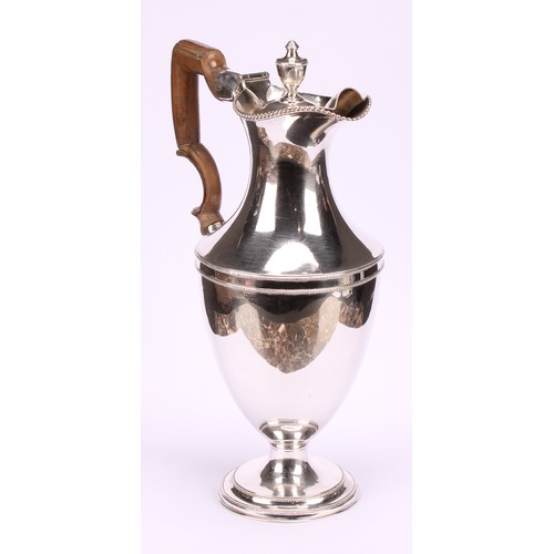 542 - A George III Old Sheffield Plate baluster wine jug, hinged cover with urnular finial, beaded borders... 